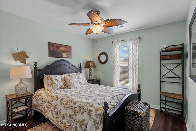 bedroom featuring ceiling fan and dark wood-type flooring