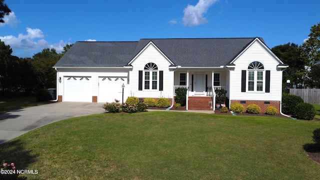 ranch-style home featuring a front yard and a garage