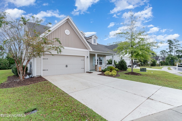 view of front facade featuring a garage and a front yard