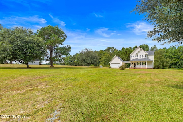 view of yard featuring a garage