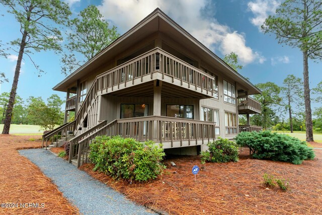 exterior space featuring a balcony