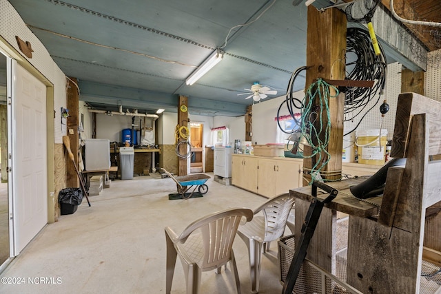 interior space with concrete flooring and washer / dryer