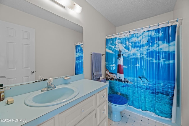 bathroom with vanity, toilet, a textured ceiling, and walk in shower