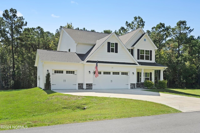 view of front facade featuring a garage and a front lawn