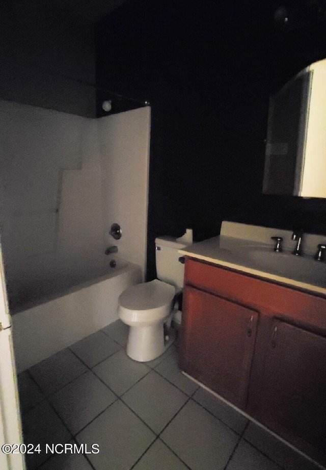 full bathroom featuring shower / bathing tub combination, vanity, toilet, and tile patterned floors