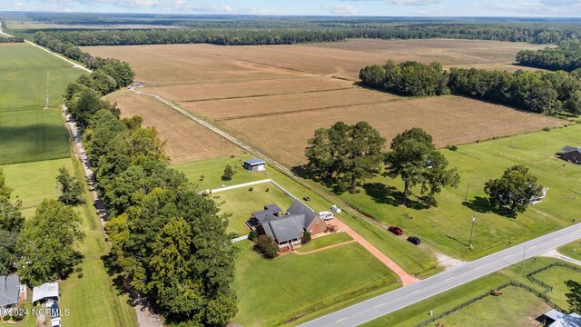 birds eye view of property featuring a rural view