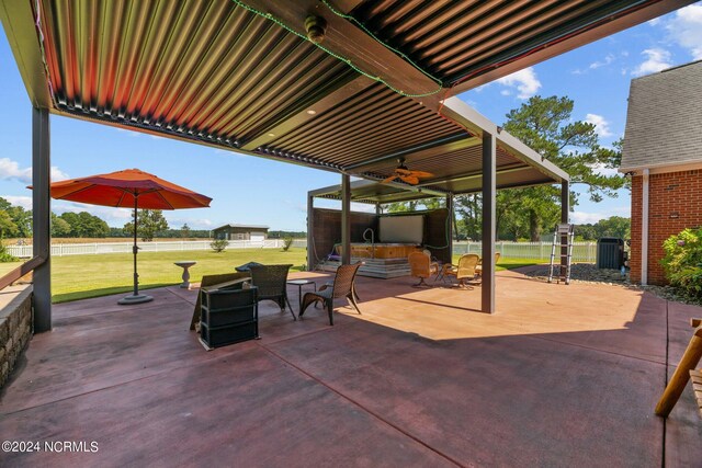 view of patio / terrace with ceiling fan and central AC unit