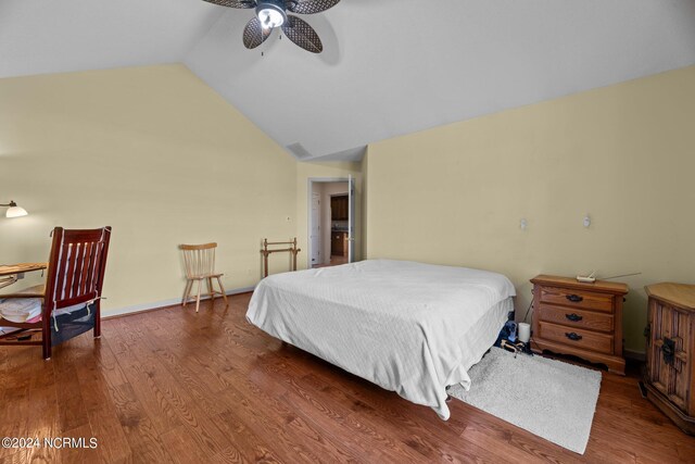 bedroom featuring vaulted ceiling, ceiling fan, and hardwood / wood-style flooring