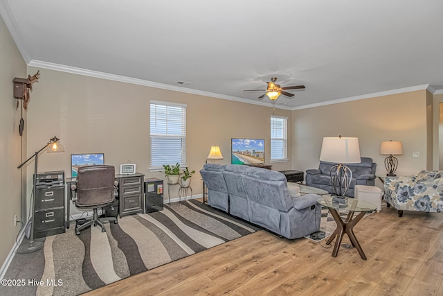 living room with ornamental molding and wood-type flooring