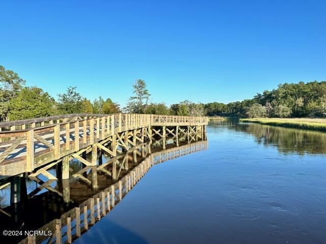 view of dock with a water view