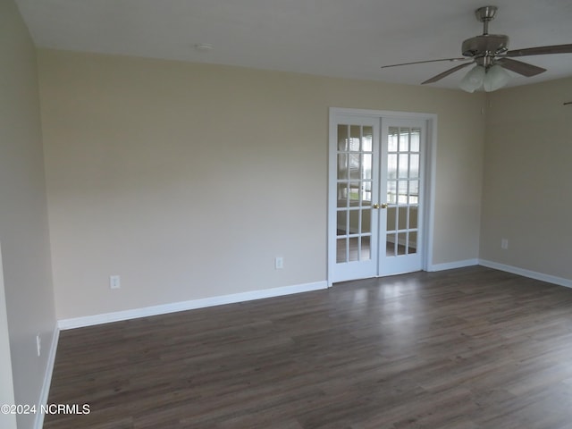 unfurnished room with dark wood-type flooring, ceiling fan, and french doors