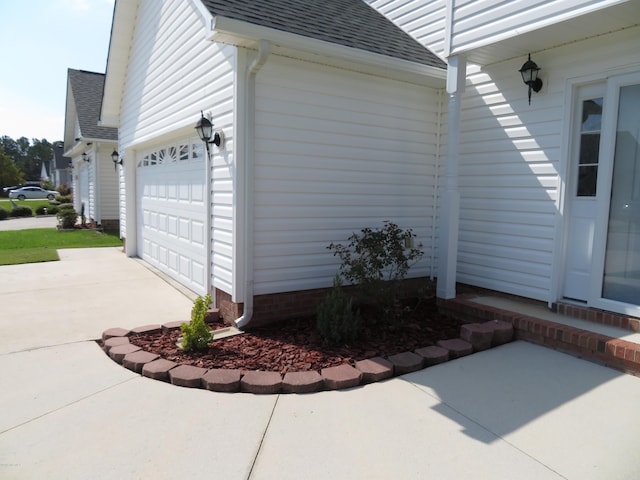 view of property exterior with a garage