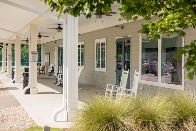 view of patio featuring ceiling fan