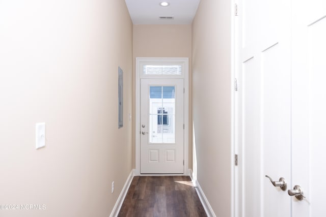 doorway with dark hardwood / wood-style flooring