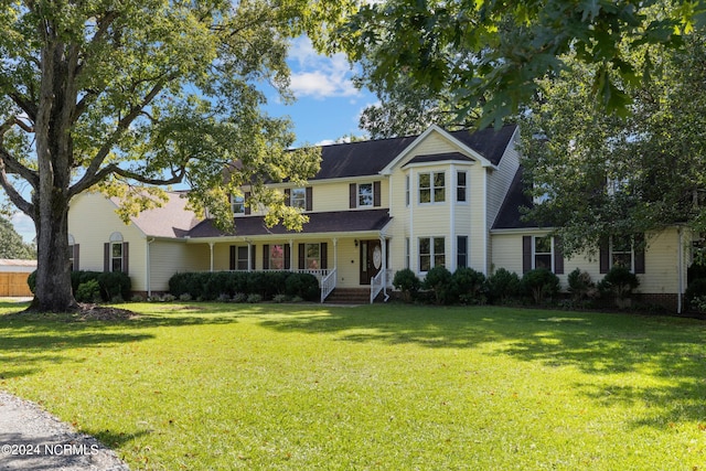 view of front of home with a front lawn