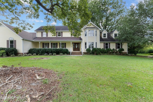 view of front of property with a front lawn