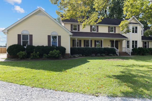 view of property with a front lawn