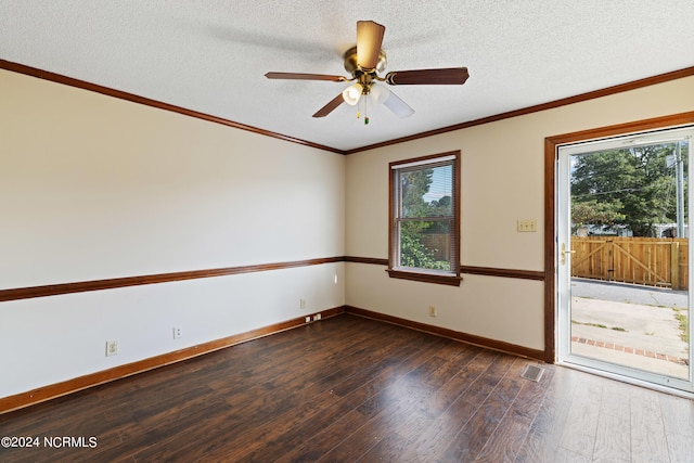 unfurnished room featuring a textured ceiling, dark hardwood / wood-style flooring, ceiling fan, and plenty of natural light