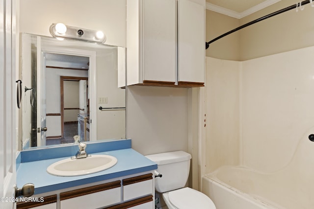 full bathroom featuring crown molding, shower / washtub combination, vanity, and toilet