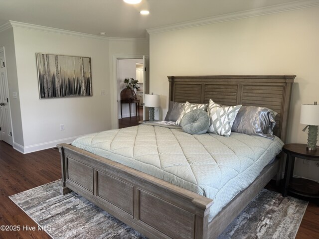 403 Main St, Bayboro, NC 28515 - bedroom featuring dark wood-type flooring, crown molding, and baseboards
