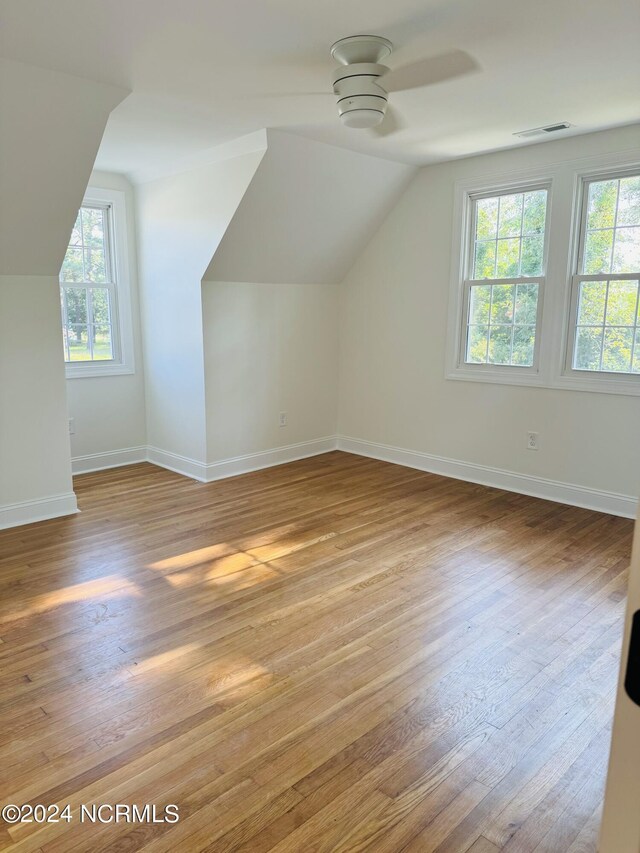 403 Main St, Bayboro, NC 28515 - additional living space with lofted ceiling, ceiling fan, plenty of natural light, and baseboards