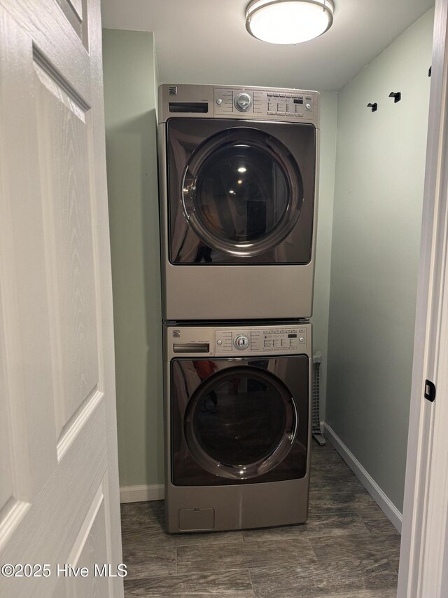 403 Main St, Bayboro, NC 28515 - washroom with stacked washer / drying machine, baseboards, and wood finished floors