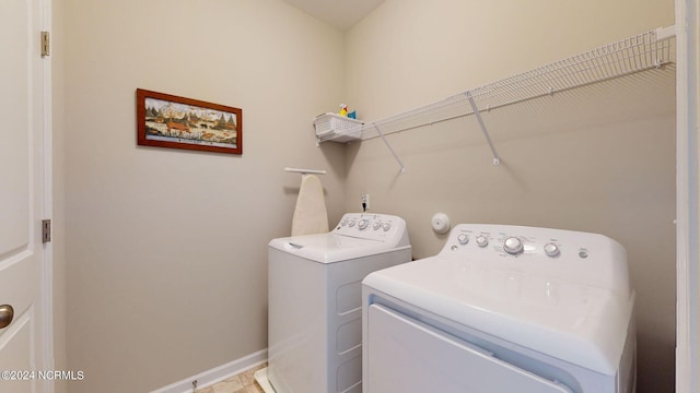 laundry room with washer and dryer