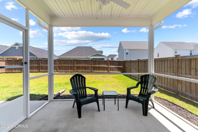 sunroom featuring plenty of natural light and ceiling fan