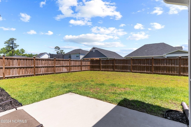 view of yard with a patio area