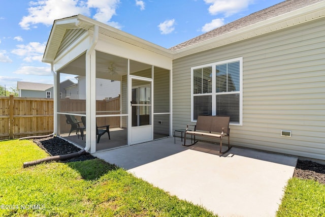 view of patio with ceiling fan