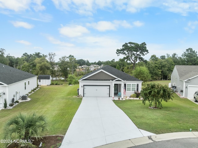 view of front facade with a garage, central AC unit, and a front lawn