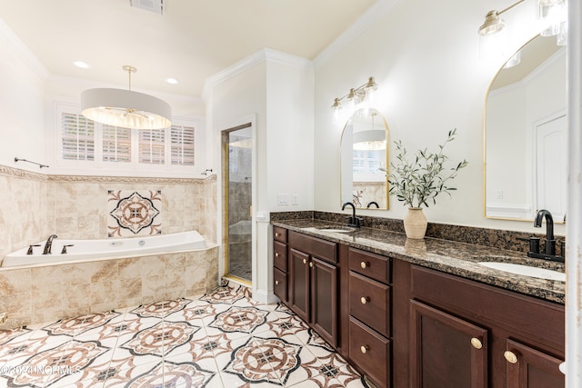 bathroom with ornamental molding, tile patterned floors, vanity, and separate shower and tub