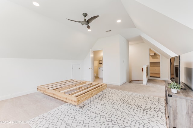 additional living space featuring light carpet, lofted ceiling, and ceiling fan