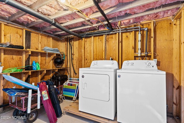 washroom featuring washing machine and dryer