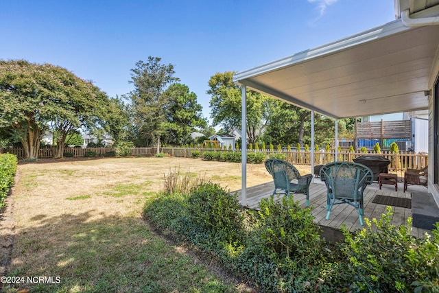 view of yard featuring a deck