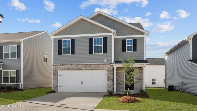 view of front of house featuring a garage, a front lawn, and central air condition unit