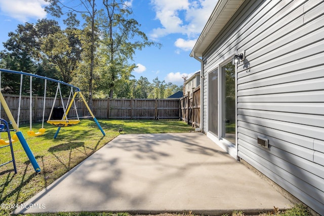 view of patio featuring a playground