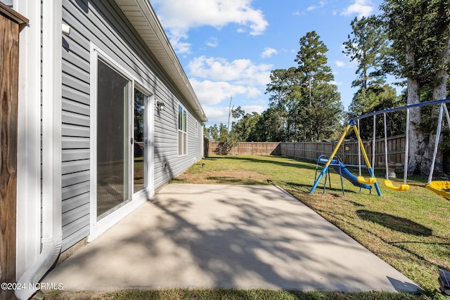 view of patio featuring a playground