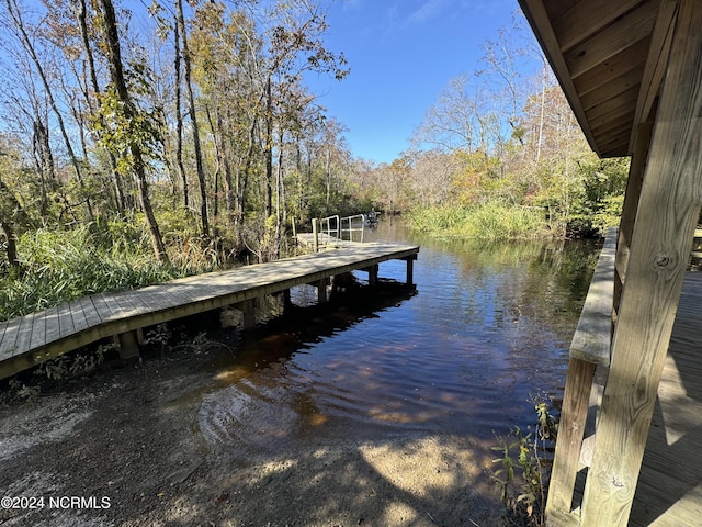 view of dock featuring a water view