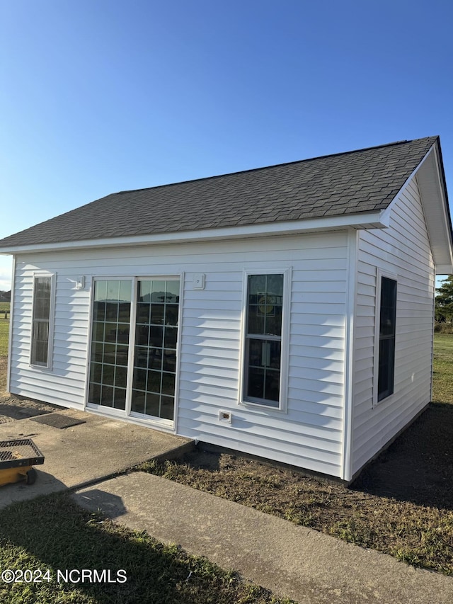 back of property with a patio area