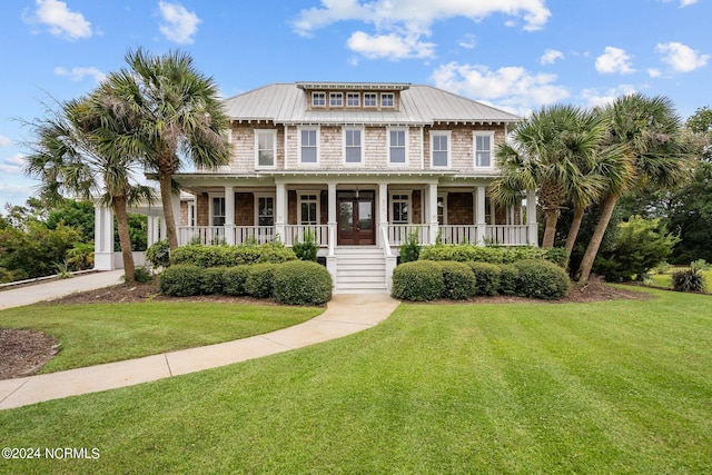 view of front of home featuring a porch and a front lawn