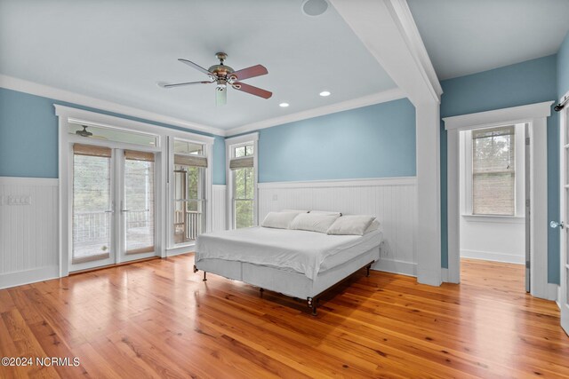 bedroom with ceiling fan, ornamental molding, access to exterior, and light hardwood / wood-style flooring