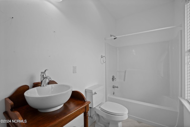 full bathroom featuring vanity, toilet, tile patterned floors, and  shower combination