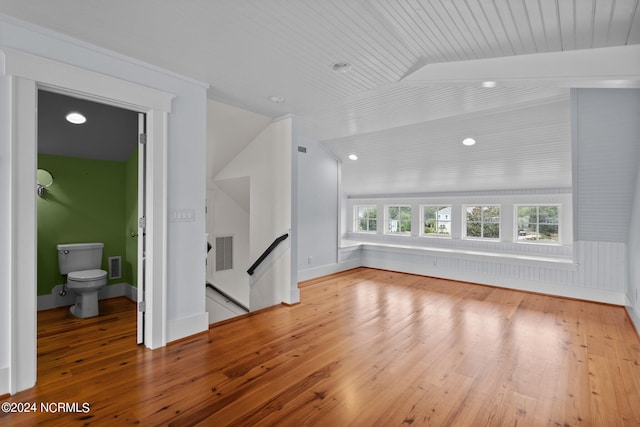 unfurnished living room with wood ceiling, hardwood / wood-style flooring, and vaulted ceiling