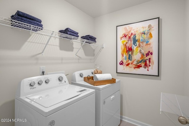 laundry room featuring washing machine and dryer