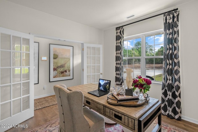 interior space with hardwood / wood-style floors