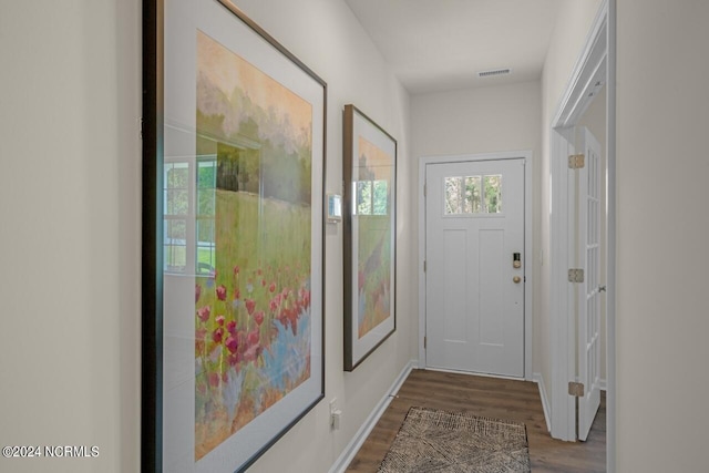 doorway to outside with dark hardwood / wood-style flooring