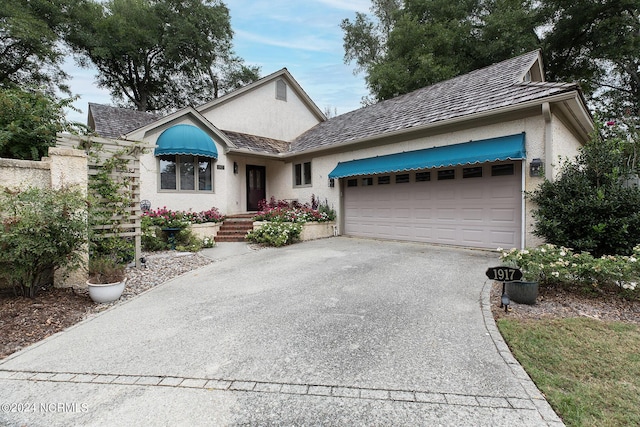 view of front of home featuring a garage