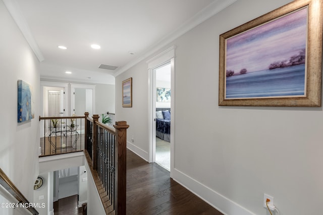 corridor with ornamental molding, dark wood-type flooring, and french doors