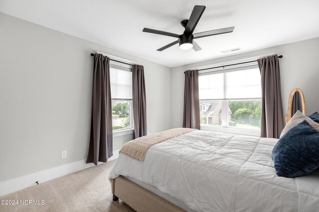 bedroom featuring carpet and ceiling fan